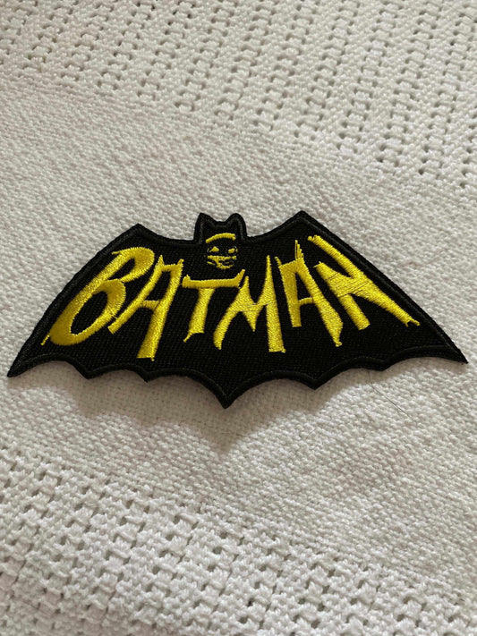 Batman 1966 TV show logo embroidered patch with yellow text on black bat shape for jackets and backpacks