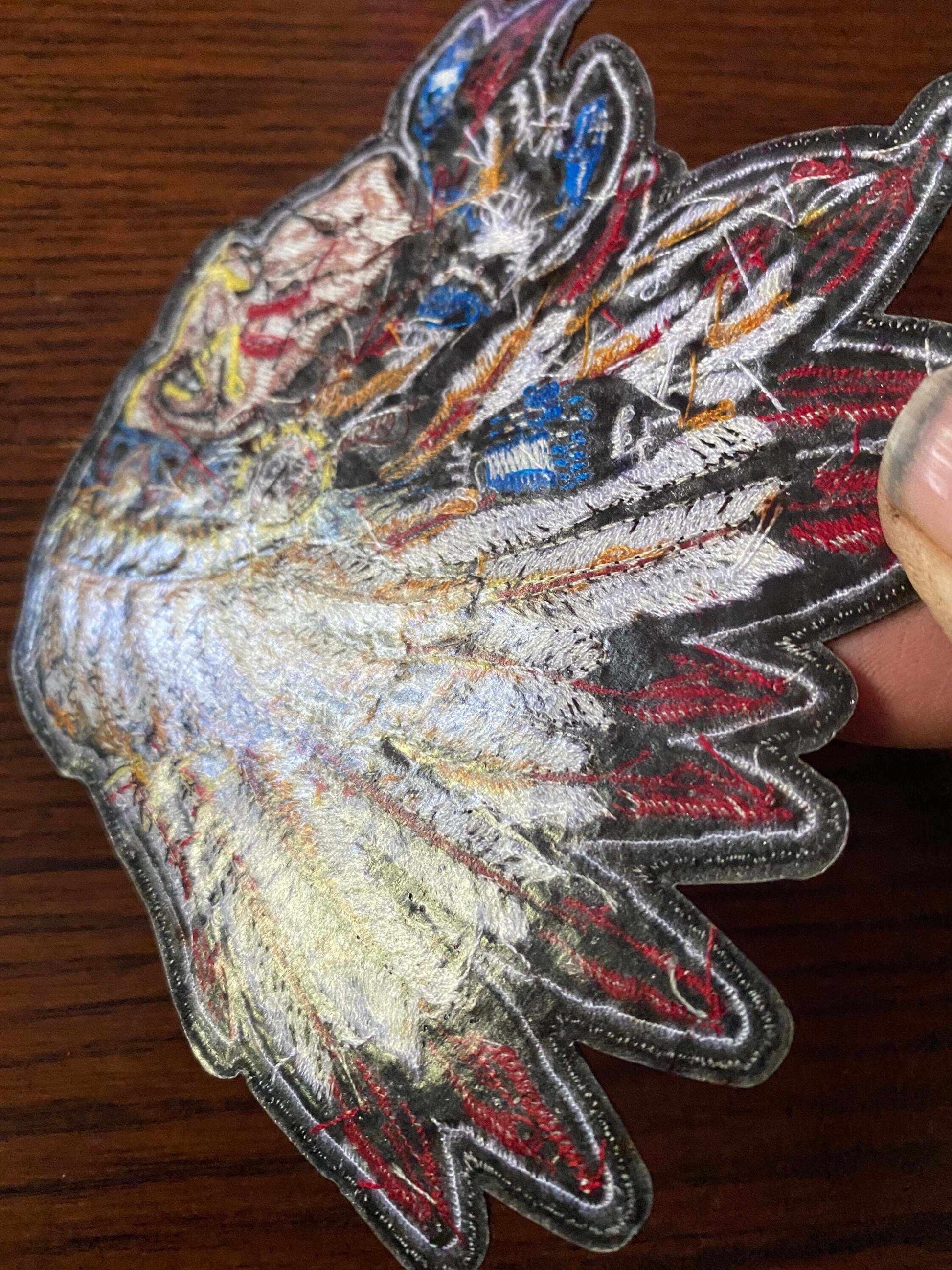 Chief patch embroidered with colorful feathers and a Native American chief design for uniforms or jackets