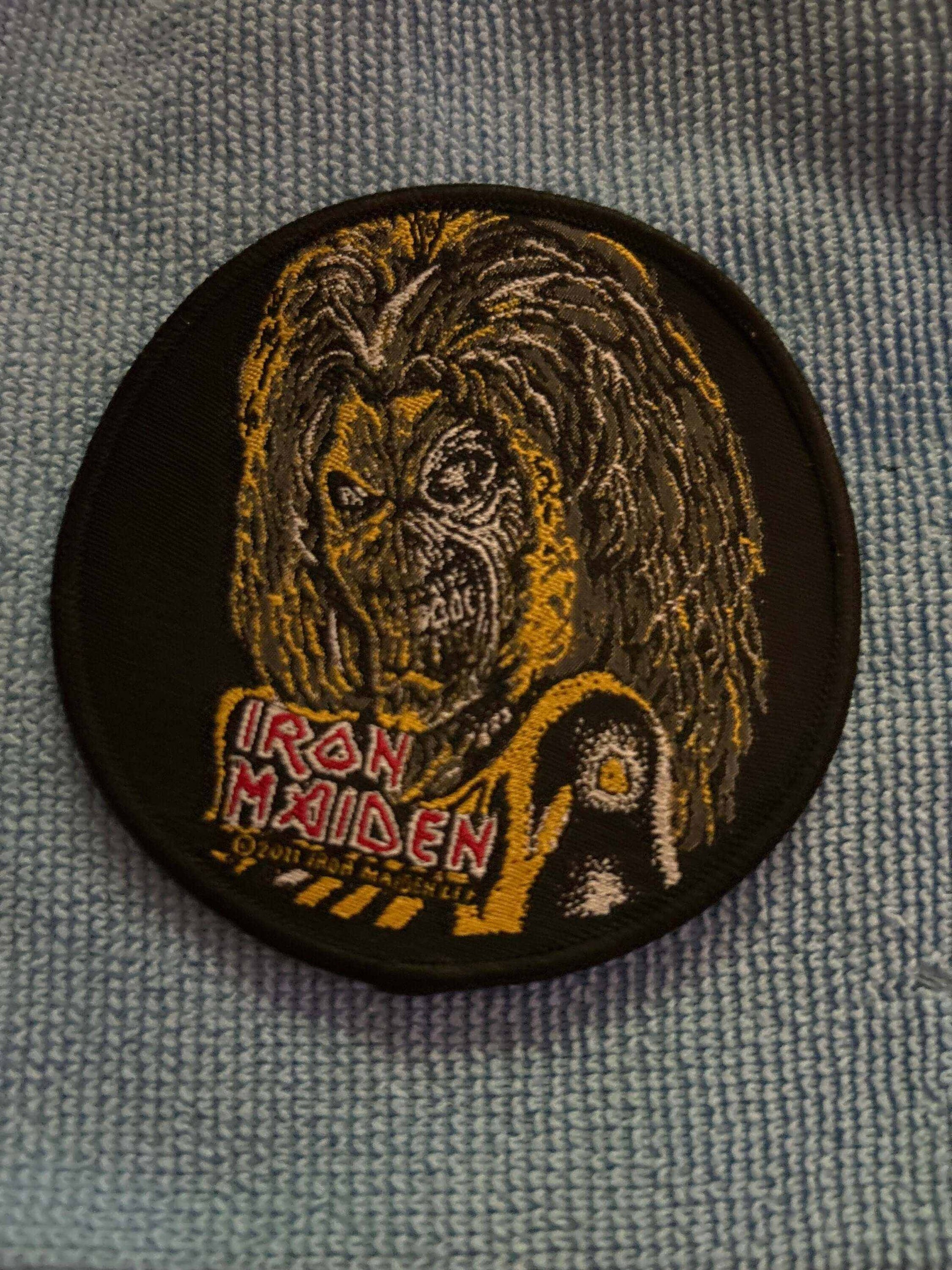 Iron Maiden Killers patch featuring embroidered band mascot Eddie and logo on black fabric background