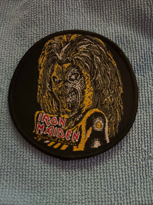Iron Maiden Killers patch featuring embroidered band mascot Eddie and logo on black fabric background