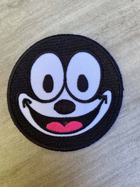 Felix the Cat black and white embroidered patch with signature grin and big eyes