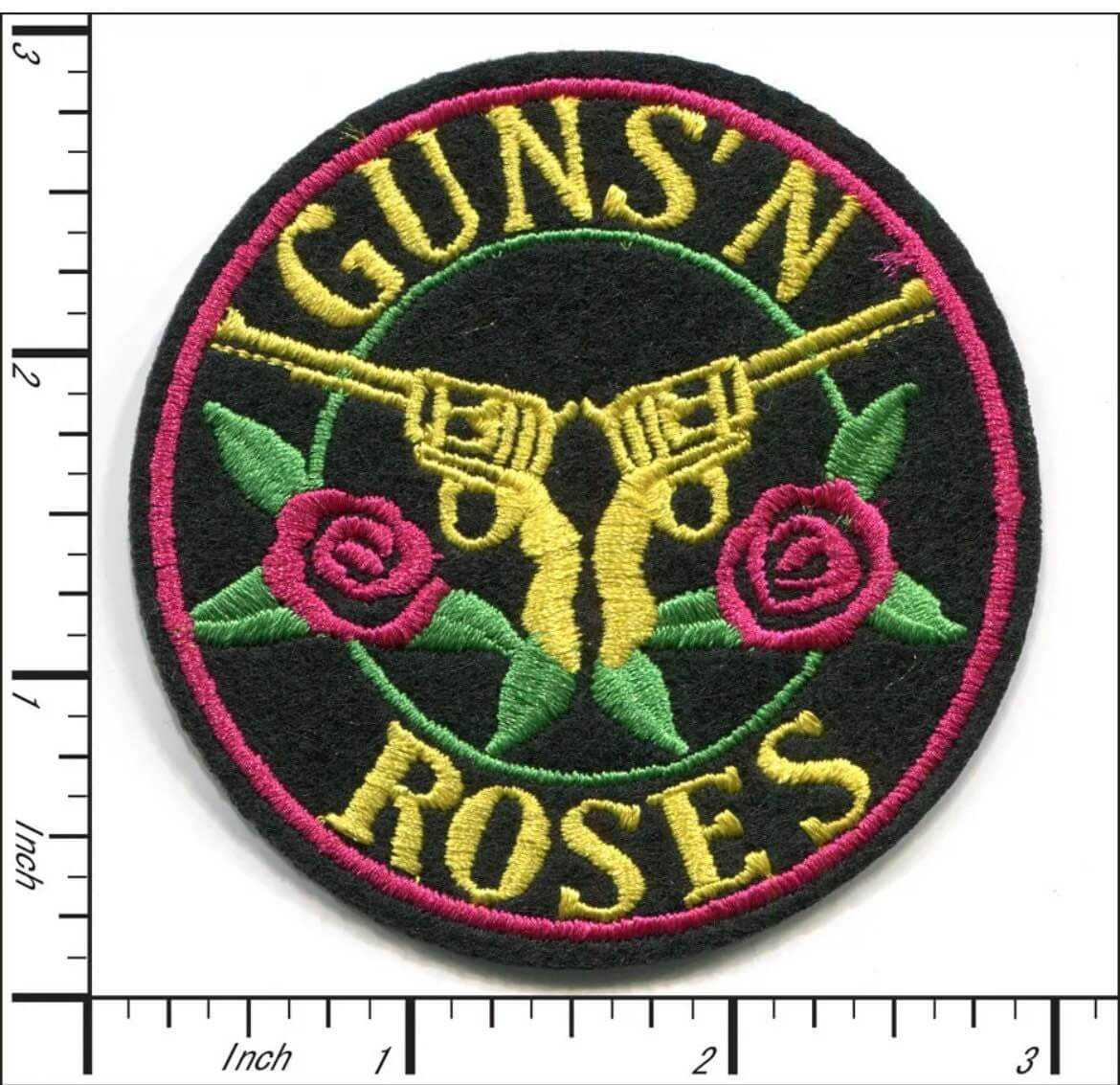 Round Guns N Roses embroidered patch with two golden revolvers and pink roses on black background