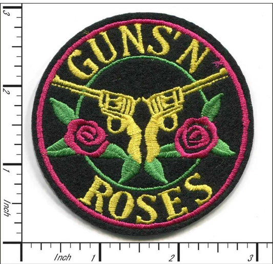 Round Guns N Roses embroidered patch with two golden revolvers and pink roses on black background